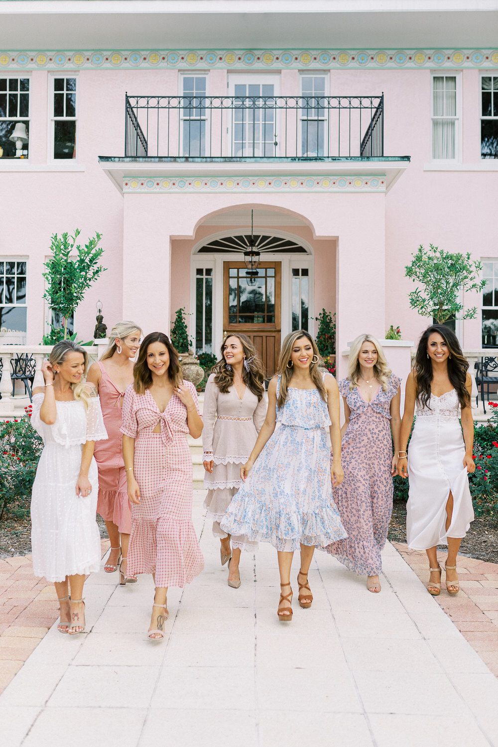 bride smiling and laughing with her friends