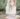 white wedding cake with holiday winter wreath detail