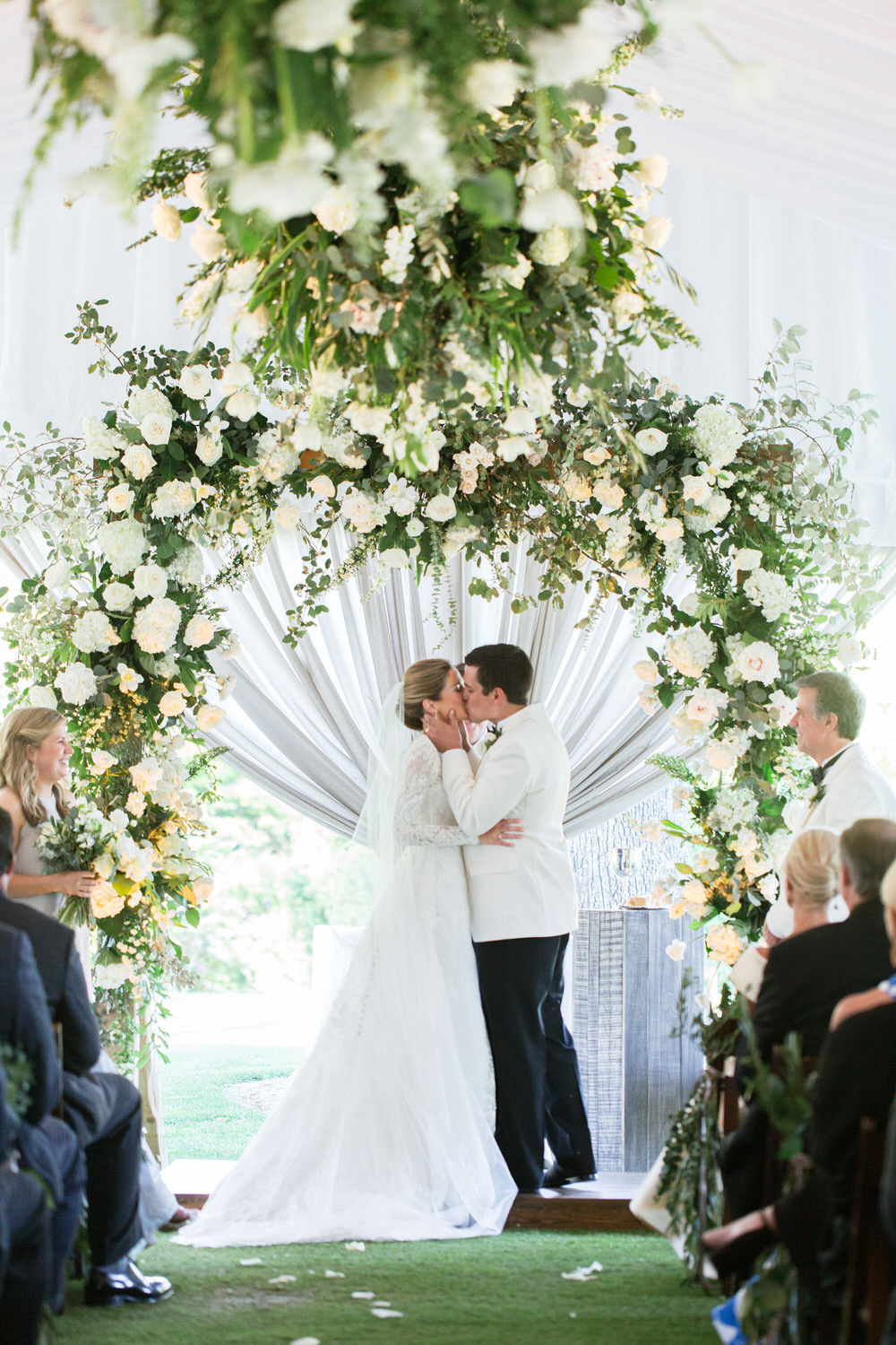 bride and groom first kiss as husband and wife